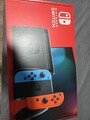 Nintendo Switch Konsole mit Joy-Con - Neon-Rot/Neon-Blau/Grau