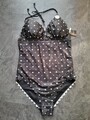 Badeanzug Gr.44/46 Schwarz mit Sternen  Infinity