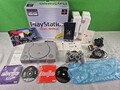 Sony PS1 Playstation 1 PAL SCPH-7002 + OVP / Originalverpackung + Anlei. + Demos
