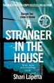 A Stranger in the House: From the author of THE COUPLE NEXT DOOR [Paperback] Lap