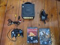Schwarzer Nintendo GameCube mit 2 Spielen und offiziellem Controller 