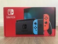 Nintendo Switch Konsole mit Zelda Joy-Con - Neon-Rot/Neon-Blau/Grau
