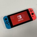 Nintendo Switch Handheld Konsole mit roten/blauen Joycons 32GB Schwarz - ohne Dock