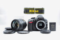 Nikon D3100 14.2MP DSLR + AF-S 18-70mm F3.5-4.5G ED DX Objektiv Kit, 315 Ausl...