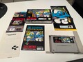 DIE SCHLÜMPFE REISEN UM DIE WELT  OVP +ANLEITUNG + POSTER  SUPER NINTENDO SNES