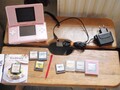 Nintendo DS + Ladekabel + 9 Spiele