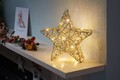 Weihnachtsdeko Wundersternchen Stern 30 cm hoch goldgeflecht funktioniert am Timer