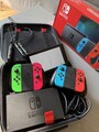 Nintendo Switch V2 HAC-001(-01) + 4 Joycons  + 2.  Halter  + Tasche + Rot Blau