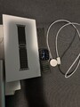 Apple Watch Ultra 49mm Titangehäuse mit Schwarz/Grau Trail Loop Armband, M/L...