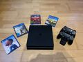 Sony PlayStation 4 Slim 1TB Schwarz mit Ladestation, 2 Controller und 4 Spielen