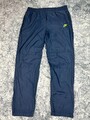 Vintage Nike Sportswear Trackpants mit kleinem neon swoosh Logo in blau Größe S
