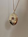 Medaillon 9 kt Gold mit Rubinen und Blumenmuster