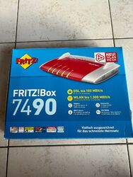 FRITZ!Box 7490 WLAN-Router mit Modem + Fritz Box 4040 Mesh Repeater