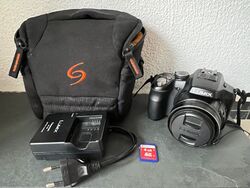 Panasonic LUMIX DMC-FZ200 12.1MP Digitalkamera 24x Superzoom Reisekamera +4GB SD