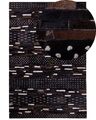 Teppich Leder dunkelbraun Muster 140 x 200 cm Akseki