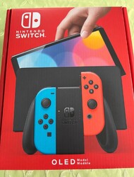 Nintendo Switch OLED-Modell  64GB  Blau/Neon-Rot mit Zubehörpaket
