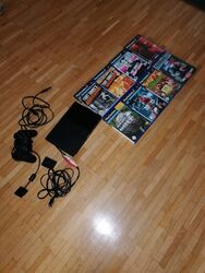 PS2 Slim Konsole mit 1 Controller, Memory Card und 8 Spielen