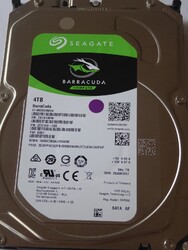 Seagate ST4000DM004 4TB SN: Z97 PN: 2CV104-568 FW: 0001 TK JAN 2017
