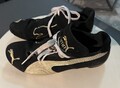 cooler Puma Sneaker Gr. 37 Top Zustand Sportschuhe Hallenturnschuhe schwarz gold