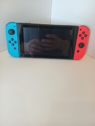 Nintendo Switch Konsole mit Joy-Con - Neon-Rot/Neon-Blau/Schwarz 