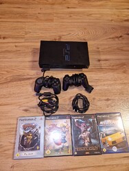 Verkaufe Playstation 2 mit 2 Controllern und 4 Spielen
