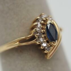 Magic Glo 14K Yellow Gold with Diamonds and Sapphire Center Stone Size 6